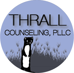 This logo is a light blue or periwinkle circle with dark gray grass and a black ferret with a white belly standing up in the lower portion of the circle. The words Thrall Counseling, PLLC are featured in black shadowed text in the top half of the circle.